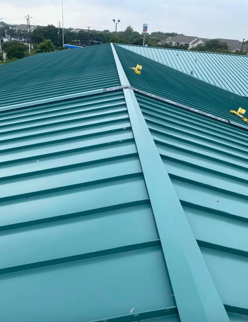 Green commercial metal roof ridge and valley for Metal Roof Repair in East Nottingham